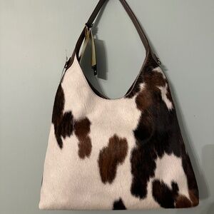 Viral cavalcanti cow hide bag